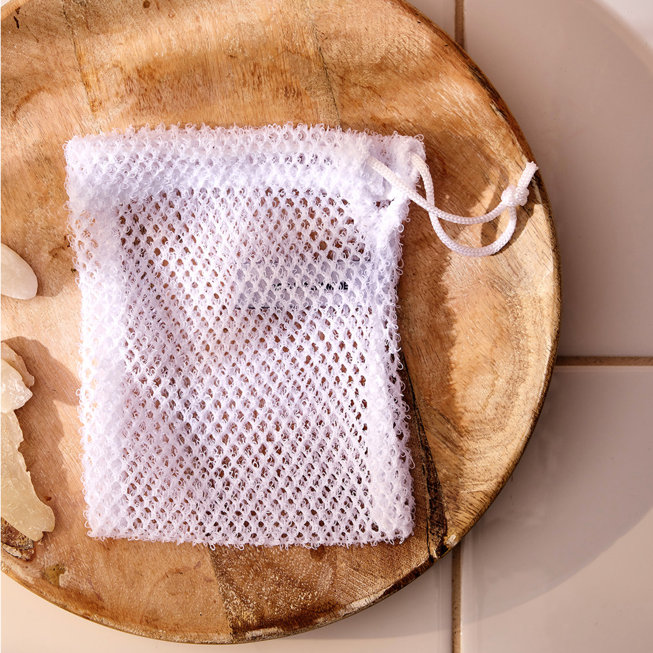 Filet à Savon H2O at Home — un petit filet en fibres naturelles qui prolonge la vie du savon solide en voyage